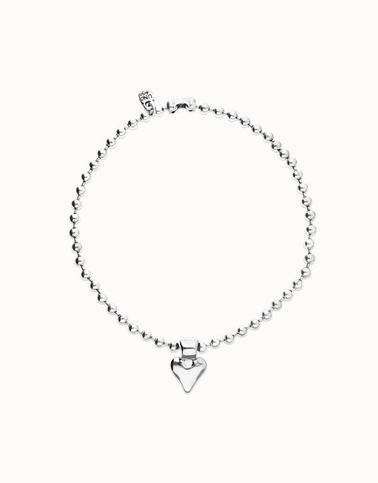 Collar con bolas bañado en plata de ley y detalle de corazón