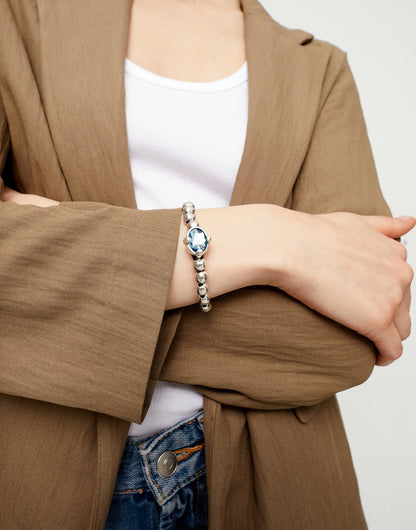 Unode50 Pulsera de bolas bañada en plata con cristal ovalado azul
