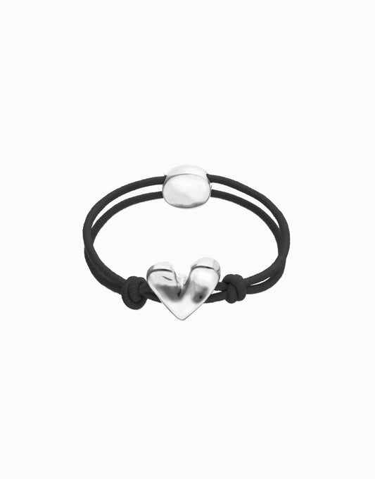 Pulsera de hilo elástico negro con corazón bañado en plata de ley