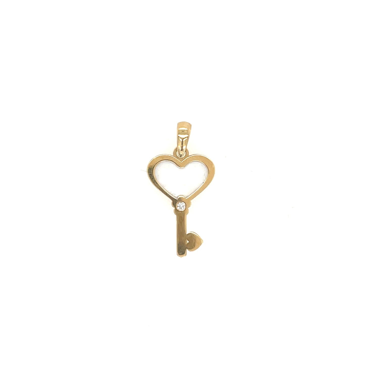 Colgante oro llave con corazón de nácar